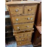 A pair of 50cm modern bedside chests, each with two short and two long drawers, set on bracket feet