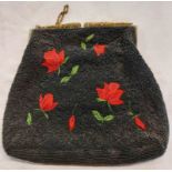 A vintage Elsie Tu beaded evening bag with embroidered rose decoration and gilt metal clasp