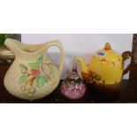 A Burleighware pottery teapot of acorn form, a Shorter jug with moulded fruit decoration and a glass