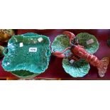 A quantity of majolica green glazed leaf dishes - sold with a Portuguese majolica dish depicting a