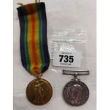 A World War I 1914-1919 Great War medal with ribbon and a 1914-1918 George V medal - both marked for