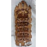 An old Black Forest carved wood folding letter rack