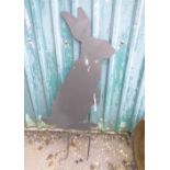 A modern painted metal garden ornament depicting a large rabbit