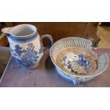 An antique Chinese porcelain jug with blue painted willow decoration (lid missing) - sold with an