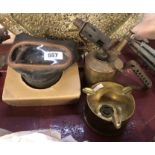 A vintage gas mask, a trench art shell case ashtray and an old brass blow lamp