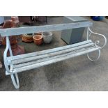 An old wrought iron scroll end bench with wooden slats - a/f
