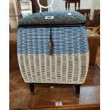 A retro woven coloured plastic wicker style laundry basket with upholstered lift-top - sold with a