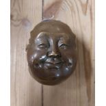 A modern cast brass four sided head with bronze effect finish