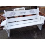 A garden bench of rustic plank form with white painted finish - made by Devon Craft of Ottery St