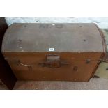 A vintage canvas dome-top travelling trunk with M.C. initials to top, lift-out internal tray and