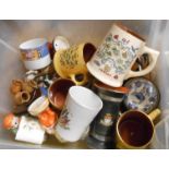 A crate containing a quantity of assorted ceramic items including Staffordshire style pepper pots,