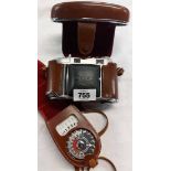 A vintage Kodak Retina camera in original leather case - sold with a light meter