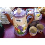 A Longpark pottery coffee set decorated in the Crocus pattern comprising coffee pot, cream and sugar