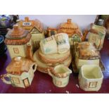 A selection of cottageware items by Price Bros. and other makers including biscuit barrel, teapot,