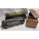 A box containing an antique tin plate Bowman's Models locomotive and a related Laer tender in