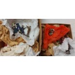 A box containing a quantity of lead figurines including Cowboys and Indians, soldiers, etc.