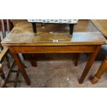 An 84cm antique mahogany fold-over tea table, set on moulded square legs