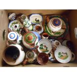 A box containing a quantity of Torquay mottoware pottery including Longpark Cockerel, Royal Torquay,