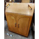 A 76cm Art Deco mixed wood bureau style cocktail cabinet with inset top, peach mirror glass lined