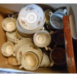A box containing a 19th Century bone china part tea set comprising coffee cups, teacups and