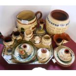 A quantity of Torquay pottery items including jug, candlestick, inkwells, etc. - various makers