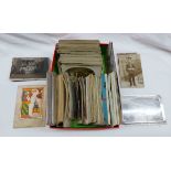 A collection of 1st World War period postcards including numerous monochrome photographic regimental