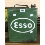 An old ESSO petrol can with brass cap and later painted finish