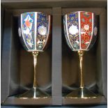 A pair of Oriental porcelain goblets with gilt metal stems in original presentation box