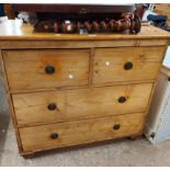 A 98cm old waxed pine chest of two short and two long drawers, set on later bun feet