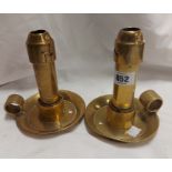 A pair of old Ratcliff heavy gauge brass chambersticks with plug-in sprung candle holders (1