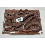 A 20th Century Chinese carved wooden box with dragon decoration and faux bamboo border