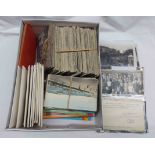 A shoe box containing a large collection of 20th Century postcards including numerous monochrome '