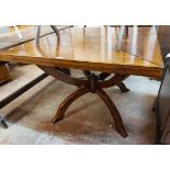 A 1.05m reproduction mahogany Assi D'Asolo Italian table with swivel action central panel drop and