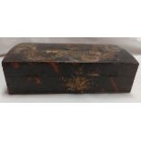 An antique lacquer work jewellery box of domed lift-top form with four smaller internal lift out