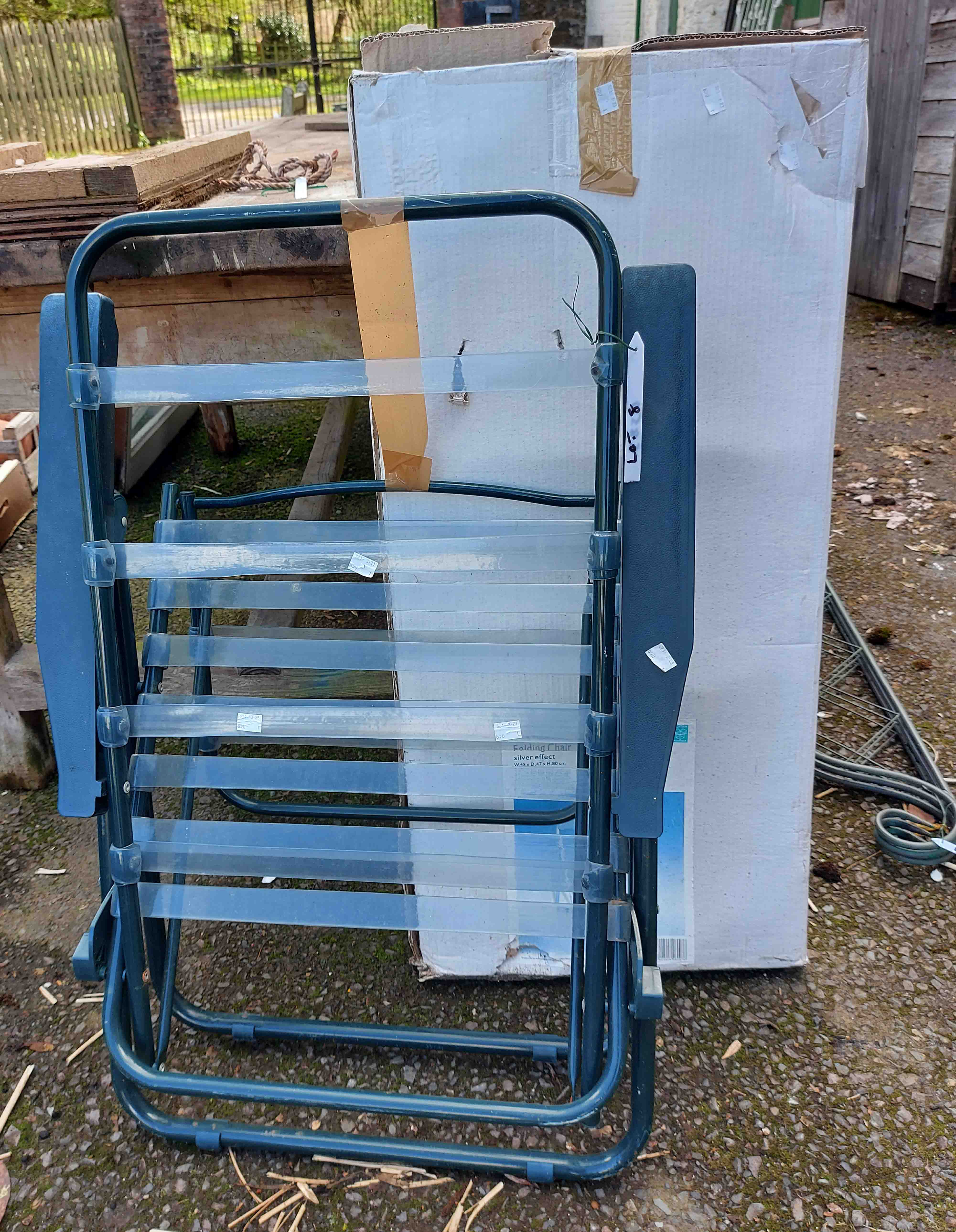 A folding garden chair - sold with another in box