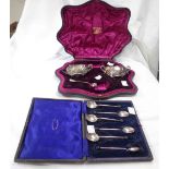 A cased part set of silver salts with flanking cast handles (two of four) and two original