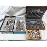 Two shoe boxes and an oak canteen containing a quantity of cased and loose silver plated cutlery,