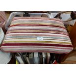 A Lloyd Loom kidney shaped ottoman laundry basket - sold with a retro footstool with striped