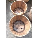A pair of 46cm diameter garden planters converted from old oak barrels with metal strapping