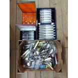 A box containing a quantity of silver plated and other cutlery including glass handled salad