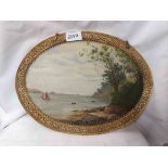A decorative gilt metal oval framed old painting on milk glass panel, depicting an estuary scene