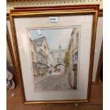 Faith Cooper: a gilt framed watercolour street scene in Totnes - sold with two prints of Totnes