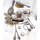 A box containing a quantity of mainly scrap silver and white metal items including dressing table