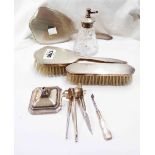 A harlequin silver and white metal dressing table set comprising hand mirror, two brushes, part