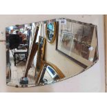 Two vintage frameless wall mirrors including one with shaped and bevelled plate