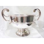 A 17.8cm diameter silver pedestal rose bowl with flanking scroll handles - London - marks rubbed