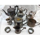 A box containing a silver plated coffee pot, teapot, claret jug and bowl, etc. - various condition