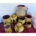 A quantity of Torquay pottery including pixie moulded jugs and teapot, Devon Tors sgraffito