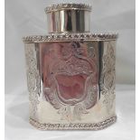 A small continental white metal tea caddy in the antique style of canted oblong form with push-fit