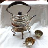 A silver plated spirit kettle of faceted oval design on original stand with burner, also cream jug